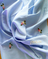 Поликоттон голубая полоска с вышивкой (цена за 1.29см)